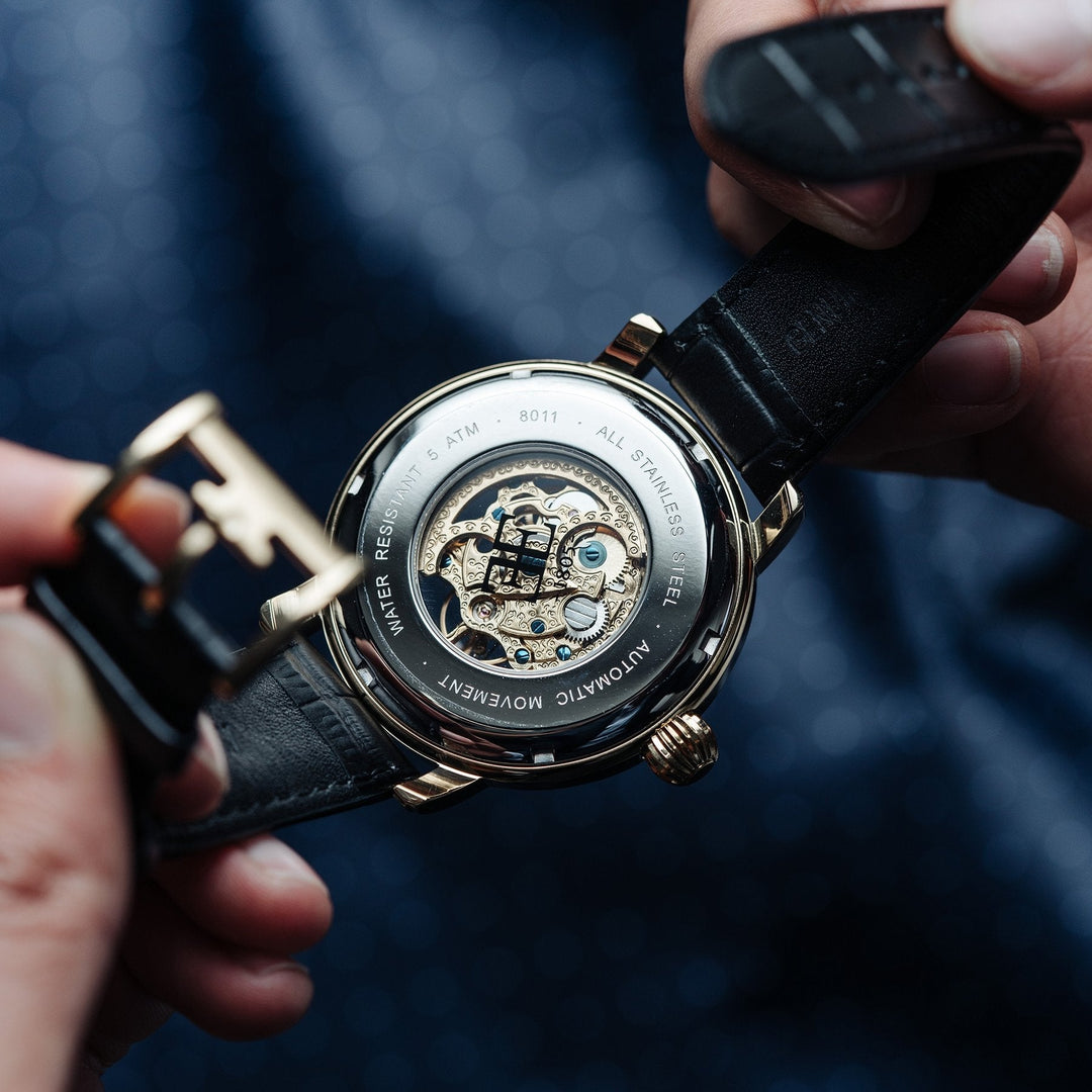 THOMAS EARNSHAW LONGCASE GRANDE SKELETON AUTOMATIC Laurel Gold